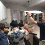 TVC crew filming in a kitchen: fastcut team in action for video content production